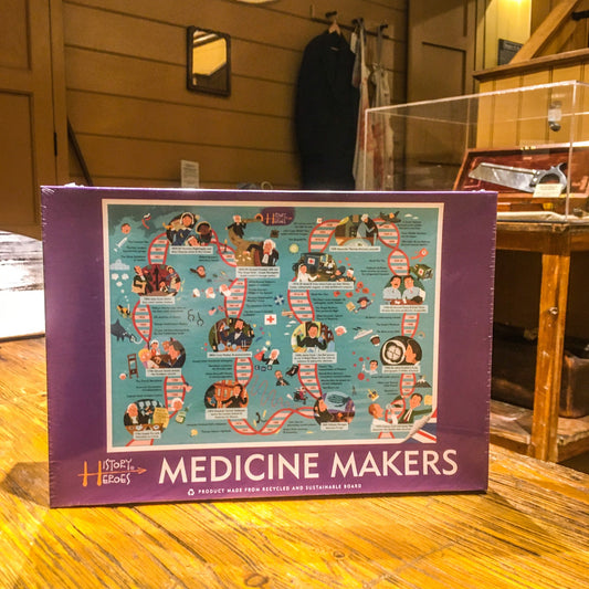 The Medicine Makers jigsaw box on the operating table within the old operating theatre