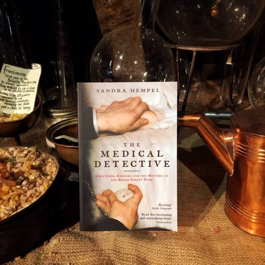The book The Medical Detective displayed in the museum's herb garret