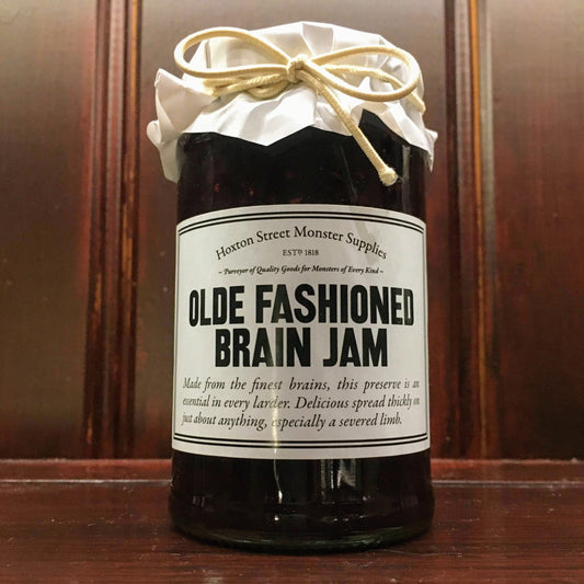 Glass jar with label 'Olde Fashioned Brain Jam'