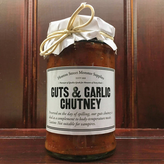 Glass jar with label 'Guts and Garlic Chutney'