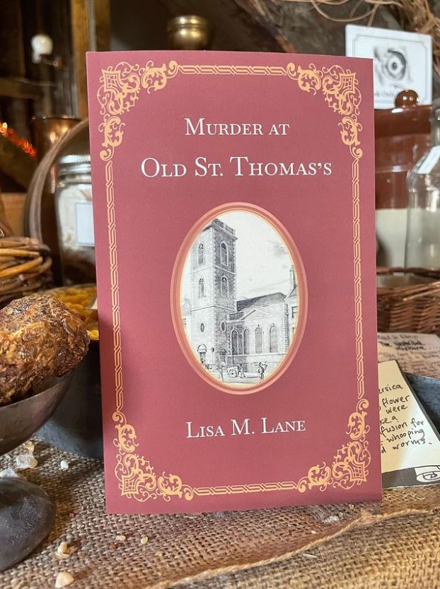 A copy of Murder at Old St. Thomas's displayed within the museum