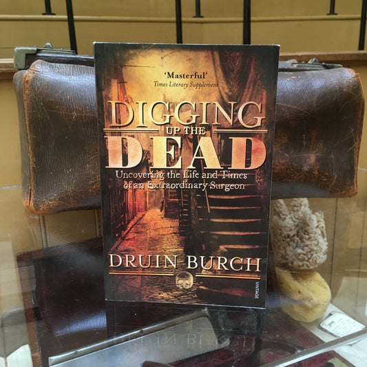 The Digging up the Dead paperback on a cabinet in the old operating theatre