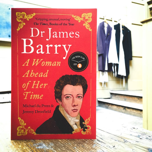 The Dr James Barry paperback on old operating table with gowns in the background