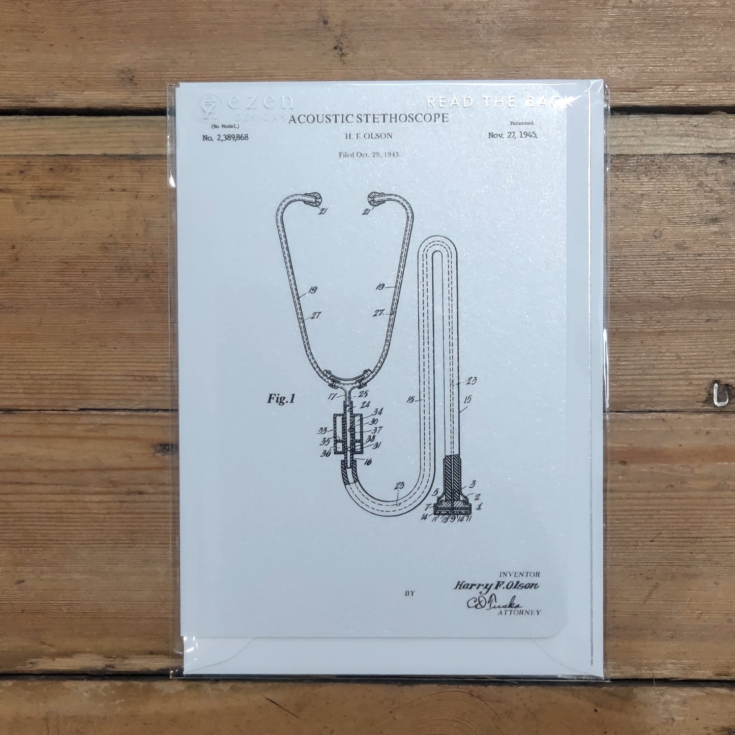 A white greetings card with a numbered illustration of a stethoscope