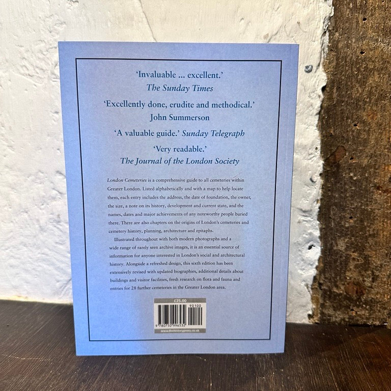 Back cover of a book with text and a barcode on a textured surface