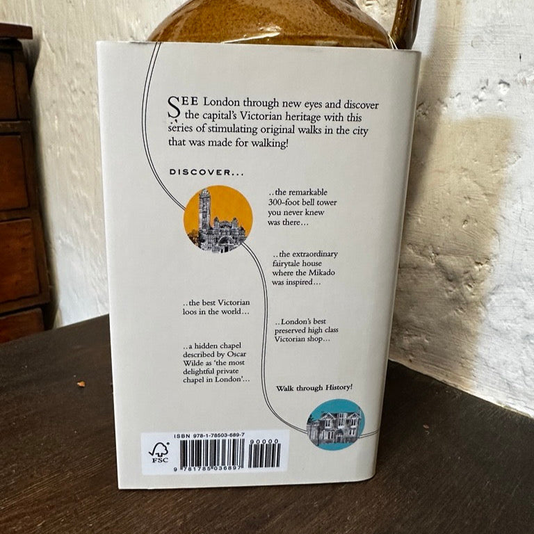 Book with text and a barcode on a wooden surface