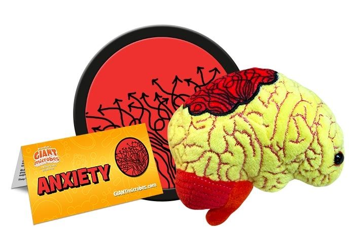 Yellow plus toy in the shape of a brain with a red cloud, next to its label