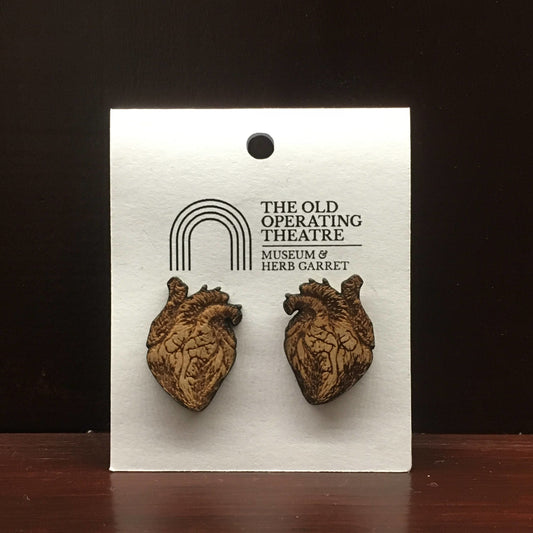 Pair of wooden earrings in the shape of an anatomical heart